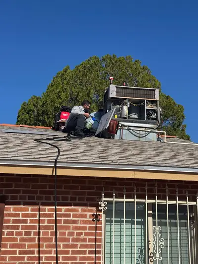 Portfolio image of SEER HVAC work done on the roof of a residential home, servicing their AC unit during the hot summer located in Oro Valley, Arizona.